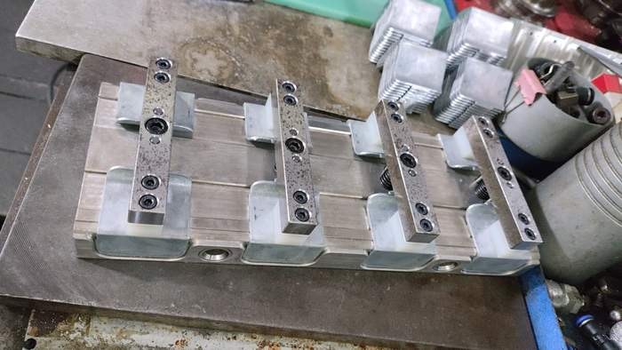 Custom tool used to machine the JetKVM backplate.